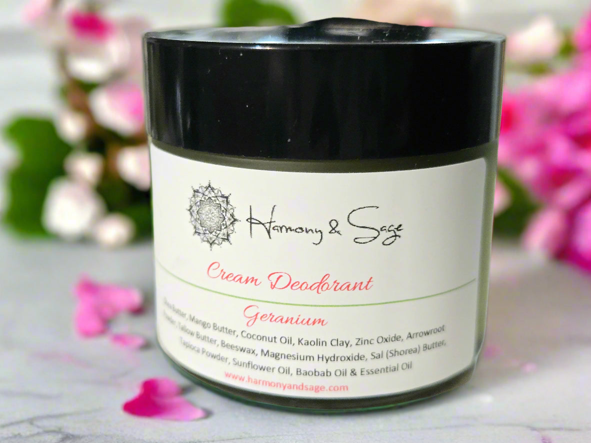 Cream deodorant jar labeled 'Harmony & Sage' on a wooden surface