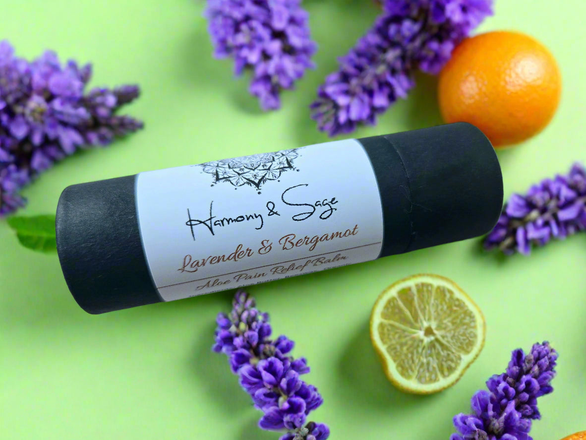 Black and white bar of soap with 'Harmony & Sage' branding on a wooden surface