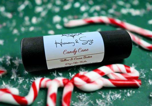 tube of candy cane scented product on a wooden surface